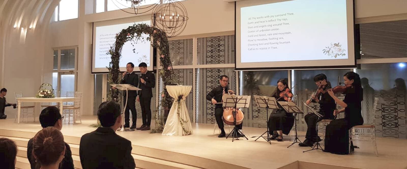 GraceNotes musicians performing at a corporate event
